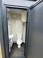 Sanitärcontainer mit WC, Waschbecken und anschließbarer Dusche, Grau